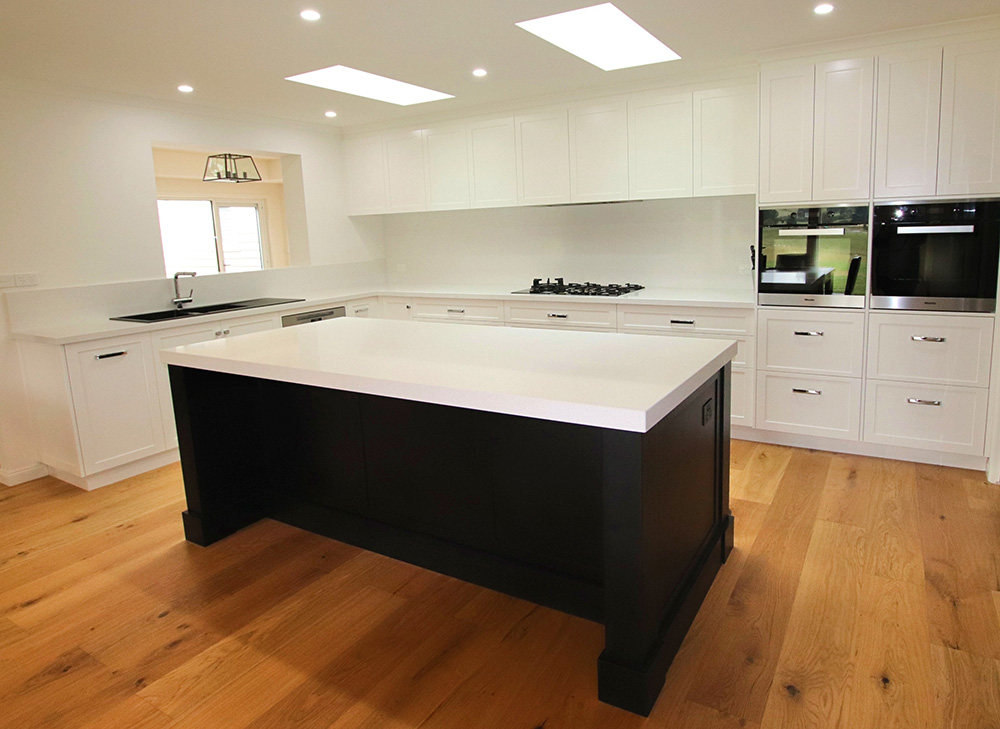 Black shaker style island bench in a custom kitchen