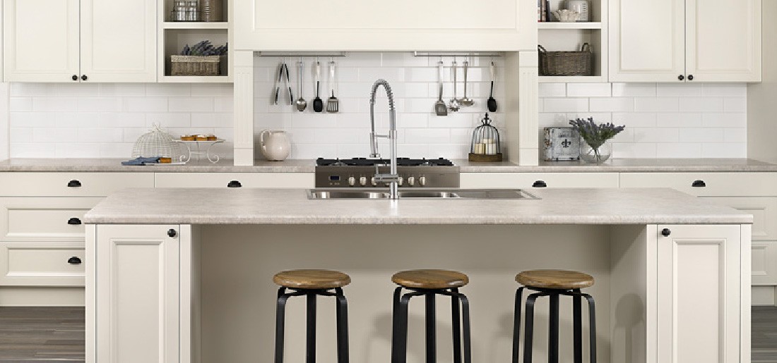Classic white shaker kitchen with island bench and timber stools