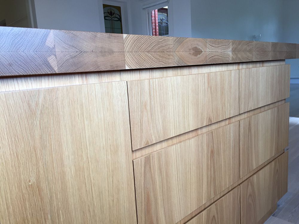 Timber laminated bench with finger pull doors and drawers