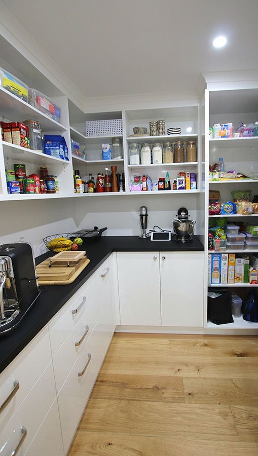Walk in pantry with custom shelving