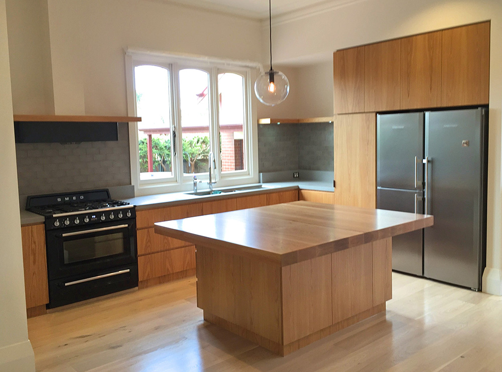 Timber kitchen with warm natural grain cabinetry